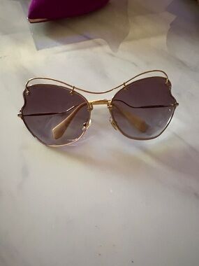 Miu Miu Gold Frame Sunglasses with Purple Gradient Lenses